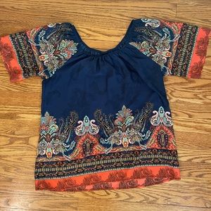Never worn, fancy top with lots of colors, flowy sleeves.